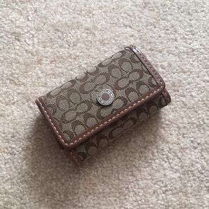 Coach contact lens case holder